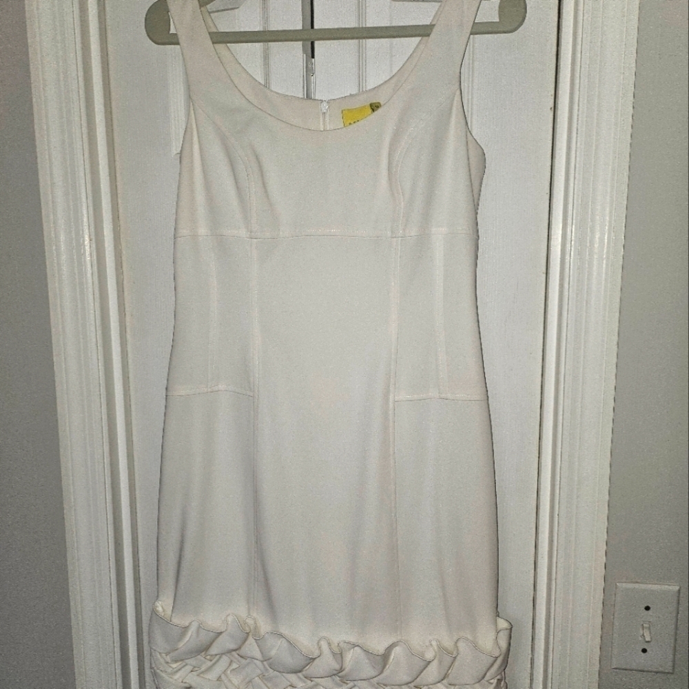 Classic White Sleeveless Dress with Ruffle Hem